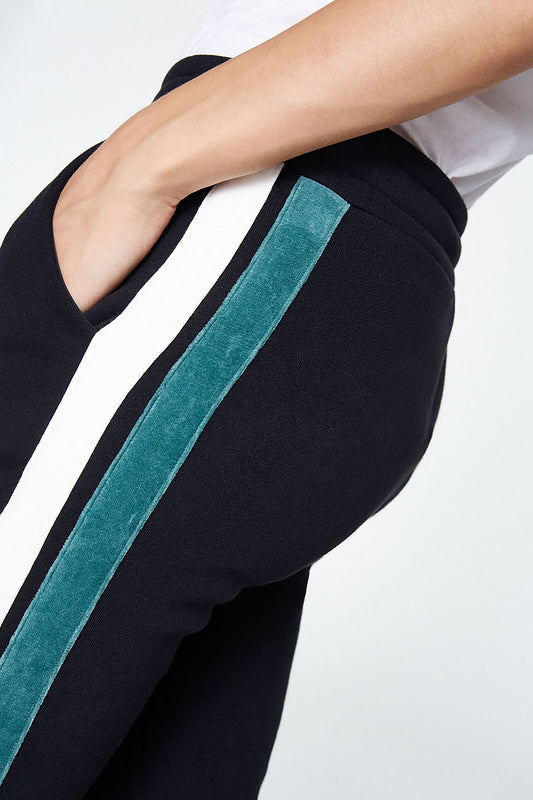 Shop aada joggers black with side stripes by Armedangels on thegreenlabels.com