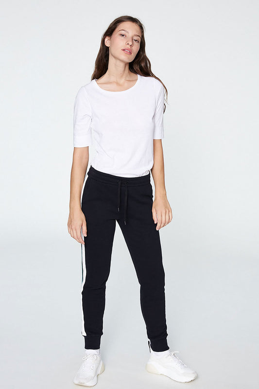 Shop aada joggers black with side stripes by Armedangels on thegreenlabels.com