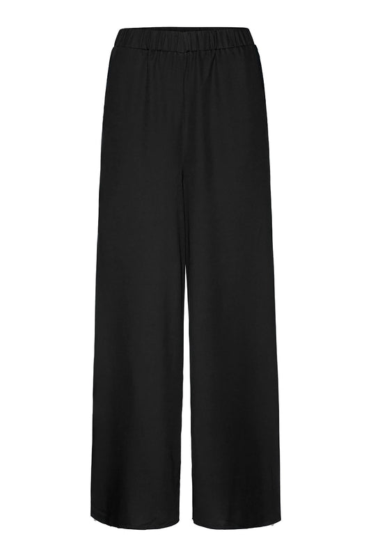 Shop naimaa pants black by Armedangels on thegreenlabels