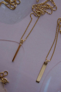 Shop balance necklace gold by Neinties on thegreenlabels