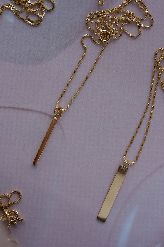 Shop balance necklace gold by Neinties on thegreenlabels