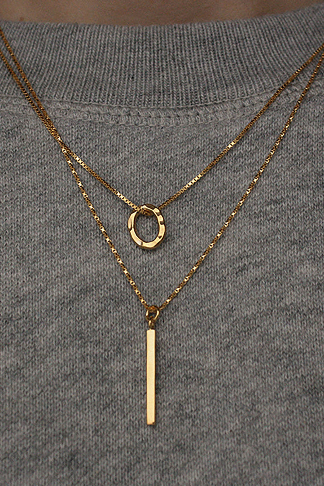 Shop balance necklace gold by Neinties on thegreenlabels