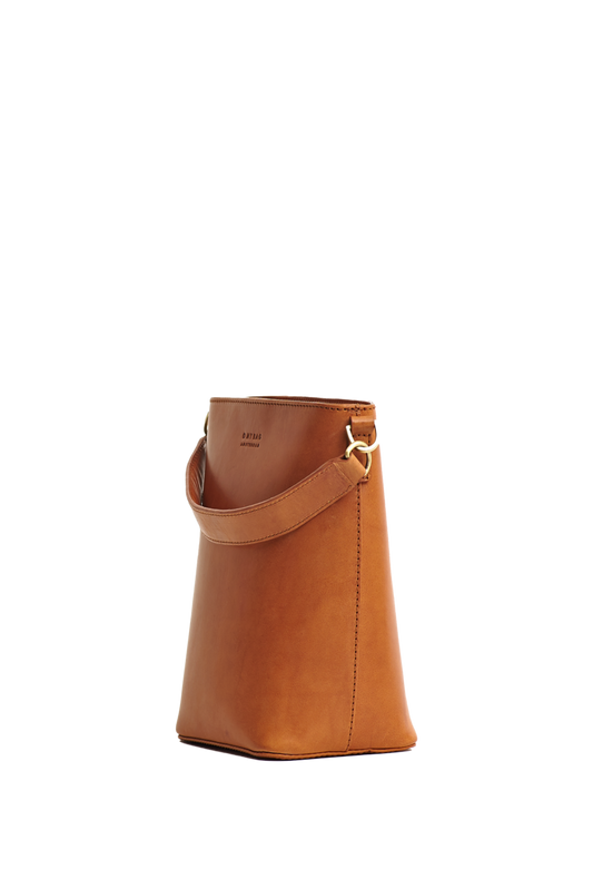 Shop bobbi bucket bag cognac classic leather by O My Bag on thegreenlabels