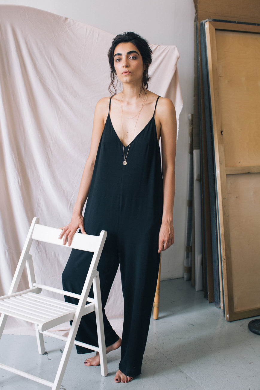 Shop sleeveless jumpsuit black by Cossac on thegreenlabels