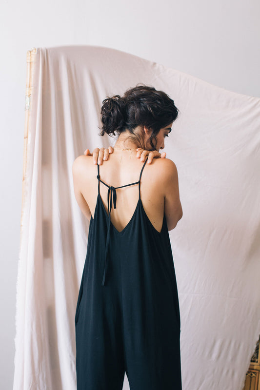 Shop sleeveless jumpsuit black by Cossac on thegreenlabels
