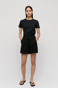 Shop intiaa black short by ARMEDANGELS on thegreenlabels.com