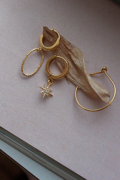 infinity earring hoop gold by Neinties on thegreenlabels