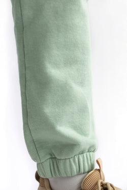 shop matcha green loose pants by capsule studio at thegreenlabels