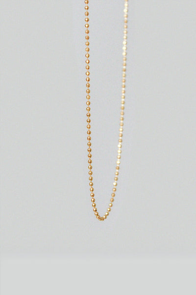 Shop maya layering necklace gold by Neinties on thegreenlabels.com