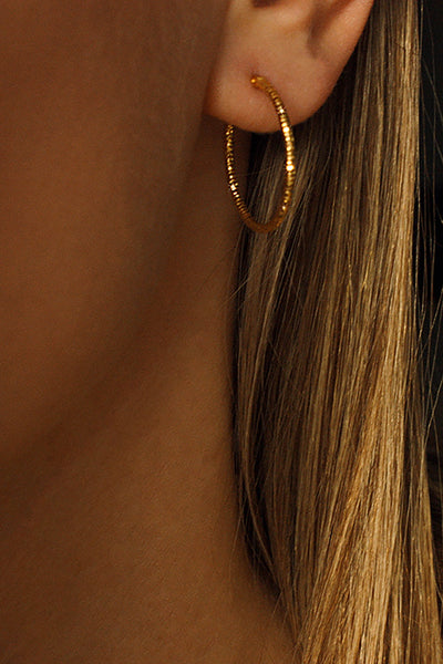 orion earring hoop gold by Neinties on thegreenlabels.com
