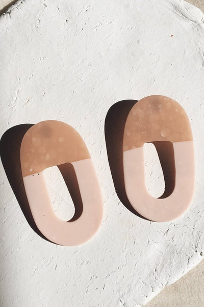 Shop salmon earrings by Hello Zephyr on thegreenlabels.com