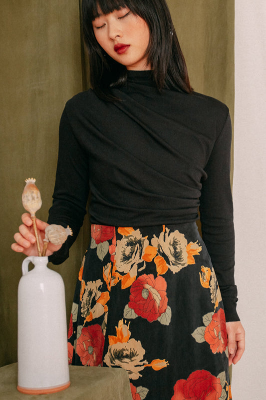 Shop drape knit top black by Cossac at thegreenlabels