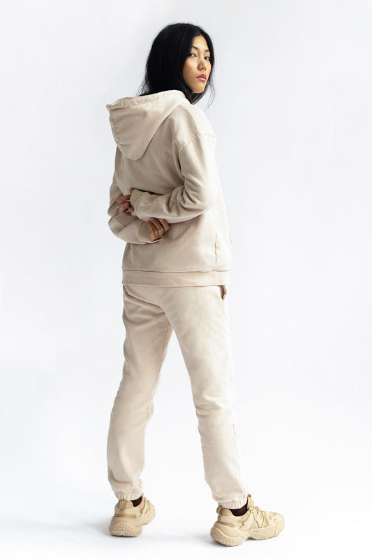 shop almond latte loose pants by capsule studio at thegreenlabels