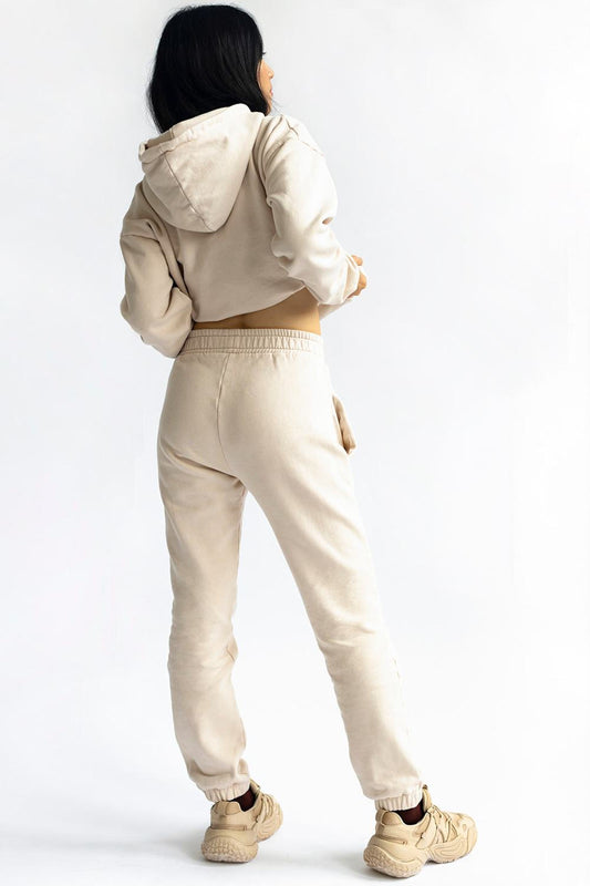 shop almond latte loose pants by capsule studio at thegreenlabels