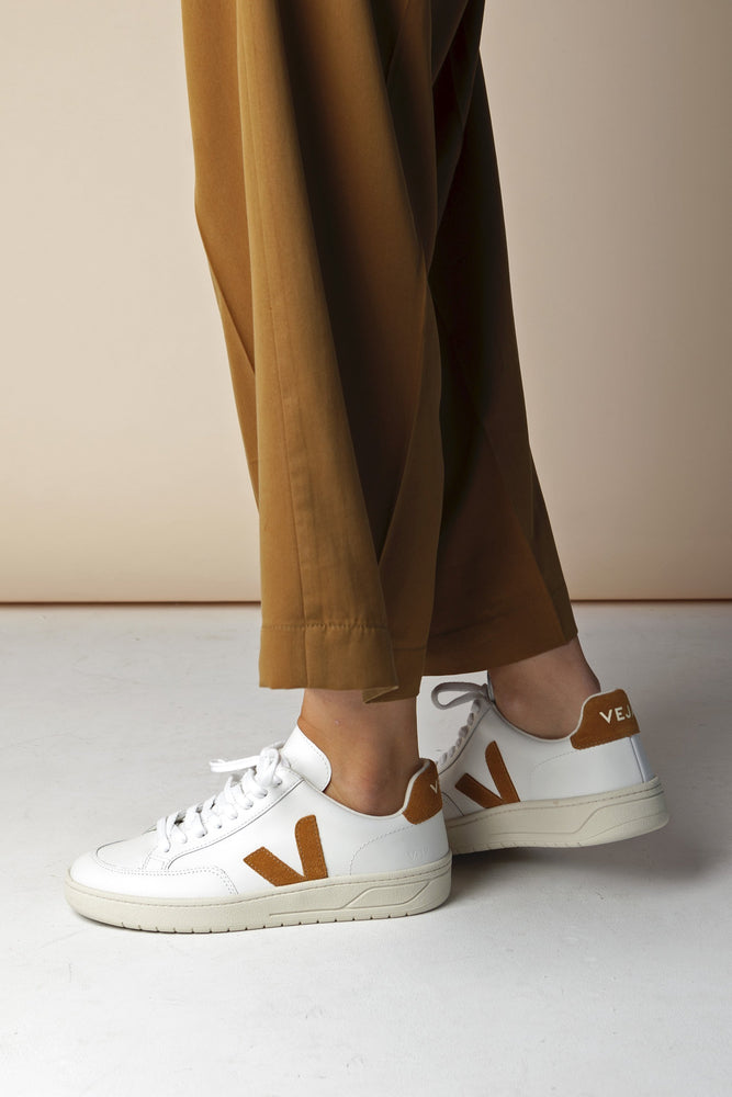 Shop v-12 sneaker leather extra white camel by Veja at thegreenlabels