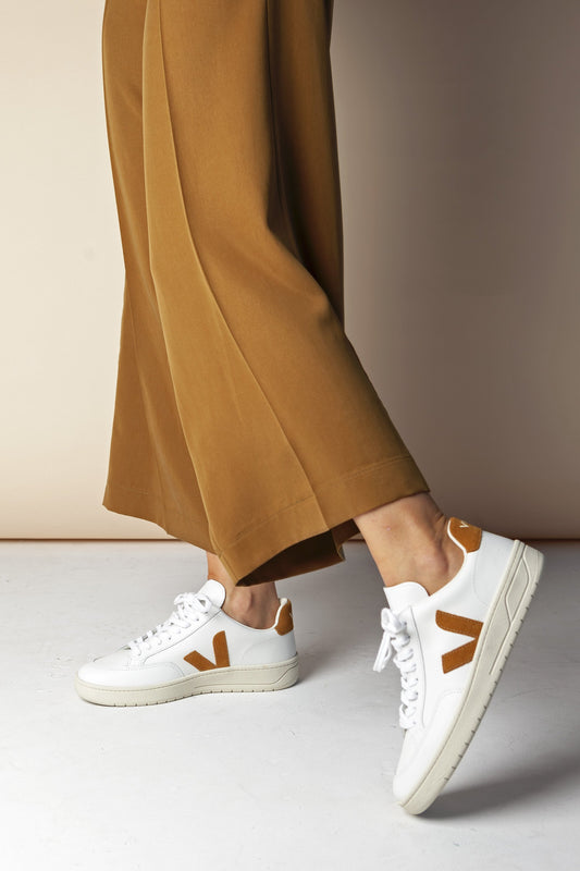 Shop v-12 sneaker leather extra white camel by Veja at thegreenlabels