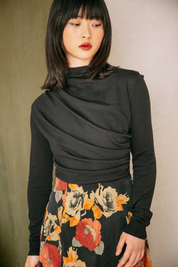 Shop drape knit top black by Cossac at thegreenlabels